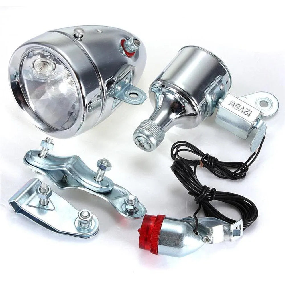 Silver bicycle dynamo generator light for front fork or rear frame mounting with friction drive mechanism