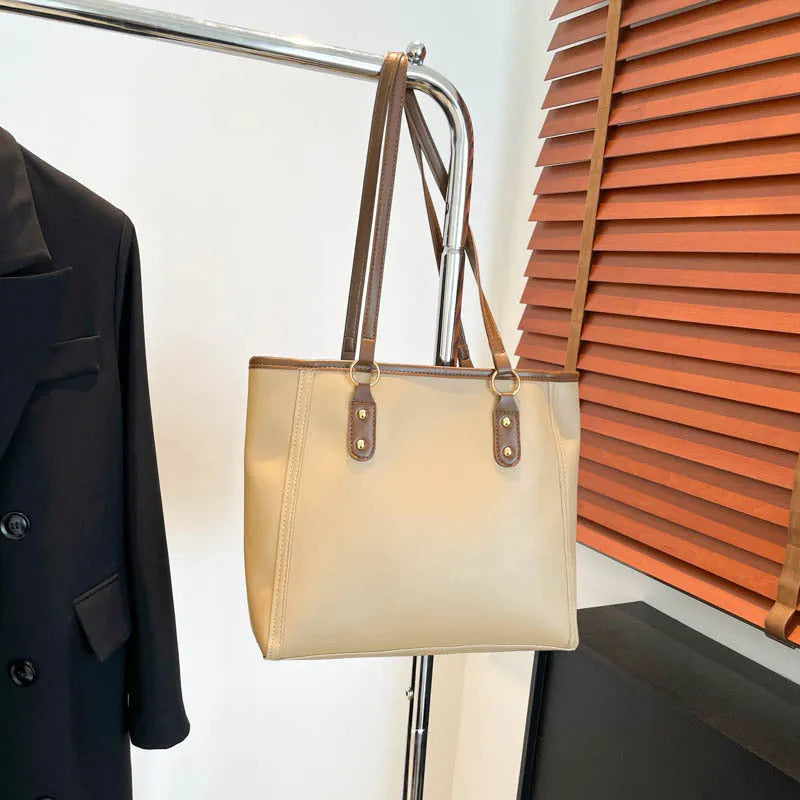 Korean style shoulder underarm bag in black PU leather with horizontal square shape and sandwich pockets