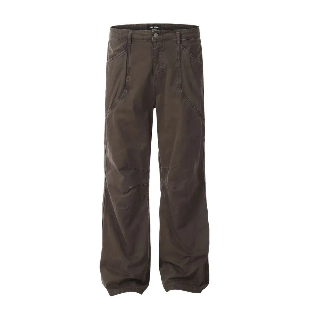Men's brown loose straight-leg trousers with high waist and wide leg opening on a hanger
