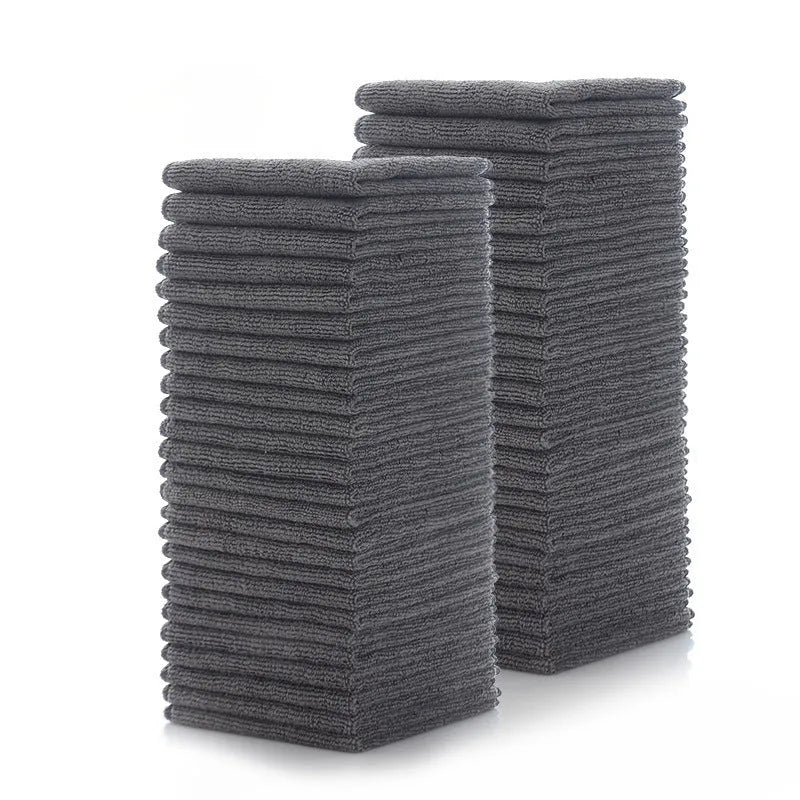 Grey microfiber kitchen cleaning cloth measuring 25cm square for oil and food residue removal