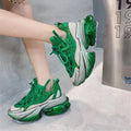 Women's leather jelly shoes with thick sole and cross-tie detail in green, blue, white, purple, or black.