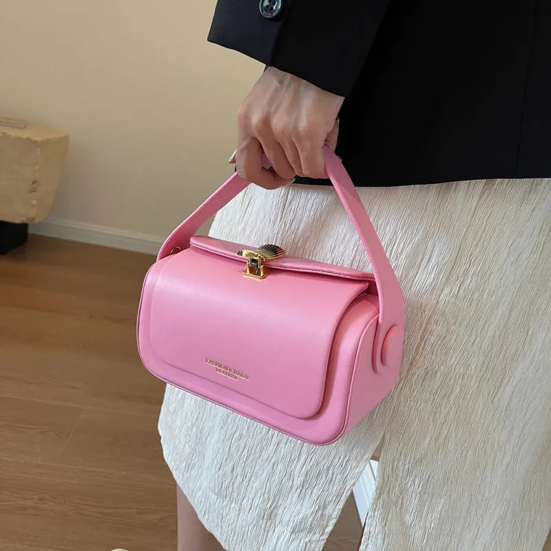Women's personalised PU leather messenger bag in casual style with letter detailing.