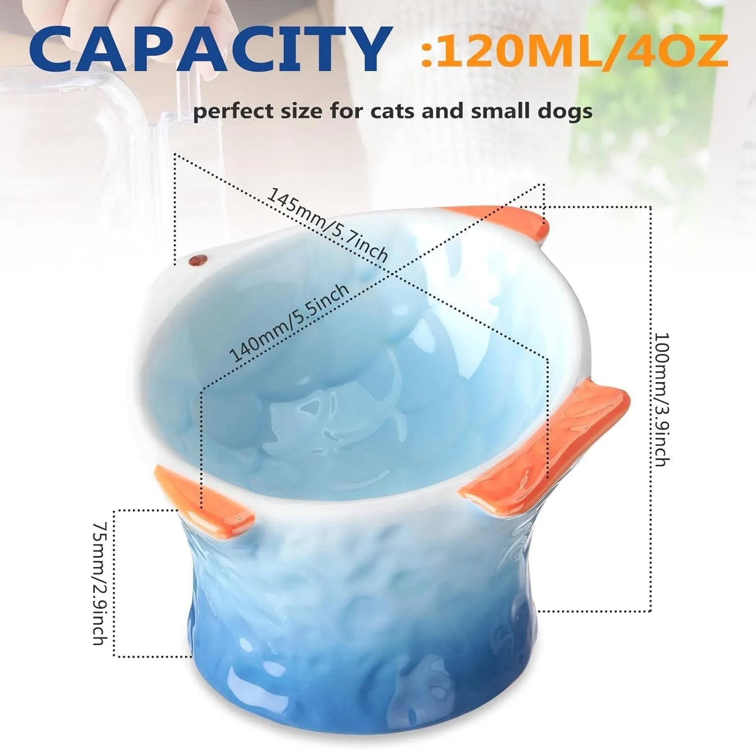Blue fish-shaped ceramic elevated cat bowl with tilted design on a non-slip base.