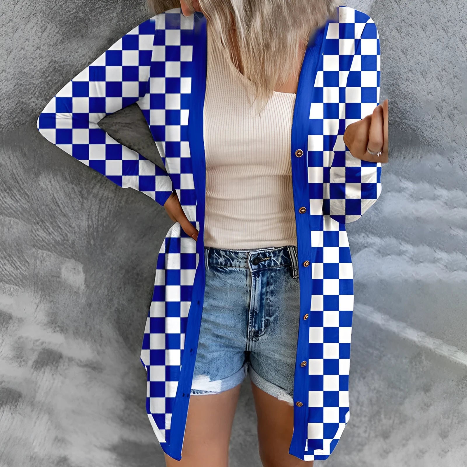 Women's long grey plaid knitted cardigan coat with regular sleeves on a hanger