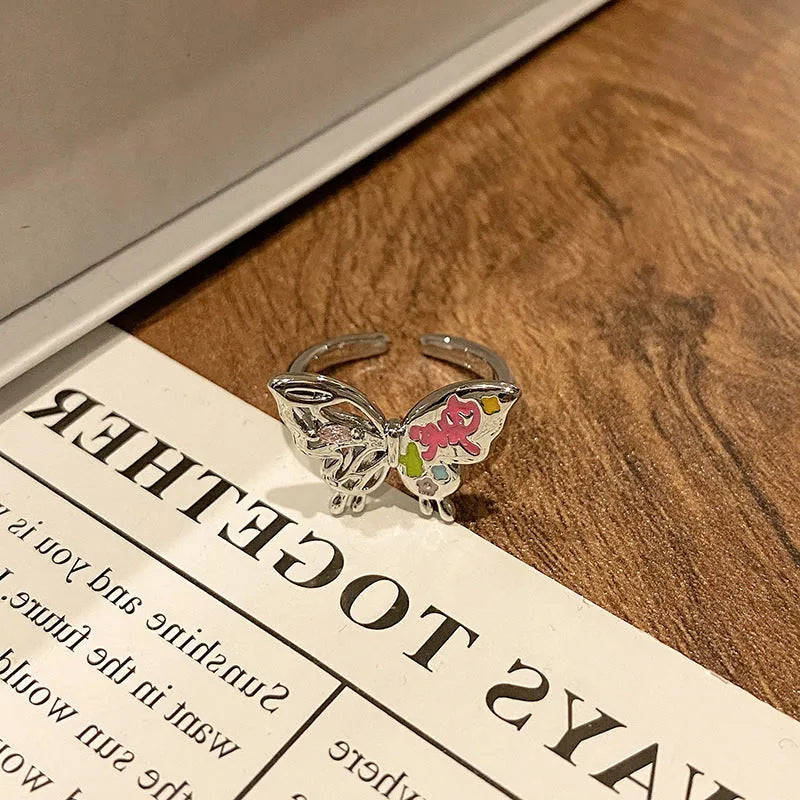 Creative Chinese butterfly women's copper ring with dripping oil treatment process in simple style.