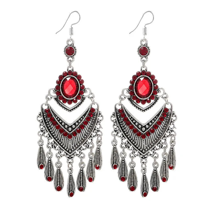 Pair of long purple drop earrings with a cascading fringe design and retro ethnic style.