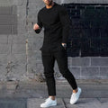 Men's light grey polyester two-piece suit with long sleeve round neck T-shirt and matching trousers laid flat.