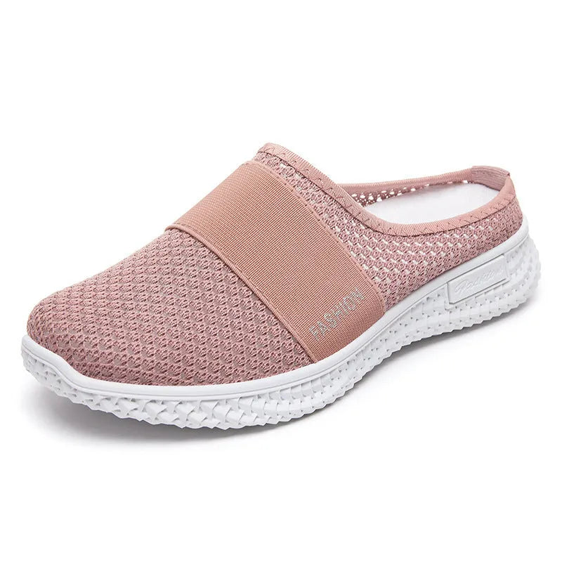 Women's breathable mesh casual shoes with flat heel, round toe, and hollow-out design in black, grey, pink, or purple.