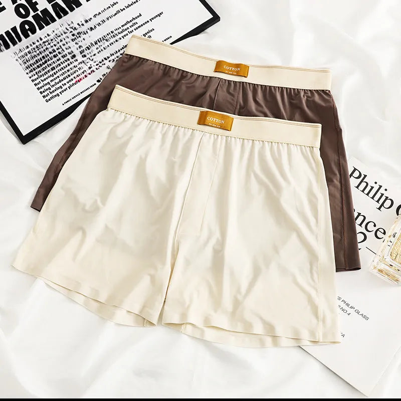 Men's ice silk underwear three-pack showing loose fit and solid colour options