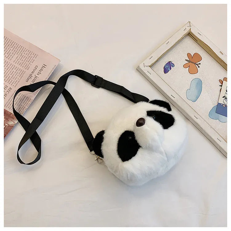 Plush cylindrical crossbody bag with panda design, showing sandwich pocket and shoulder strap