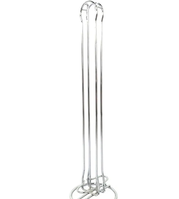 Black iron coffee capsule storage rack holding multiple pods on display shelves.