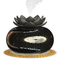 Pure black USB aromatherapy humidifier with ceramic lotus flower design on round base