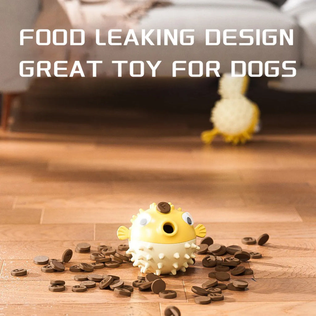 Yellow fish-shaped dog chew toy with convex texture and squeaker for aggressive chewers