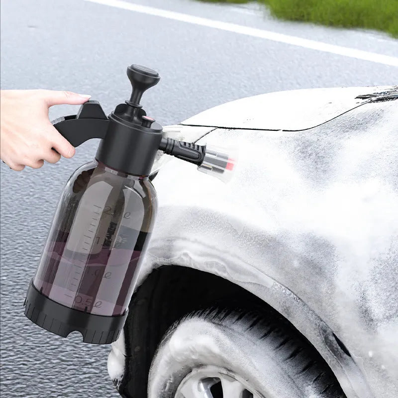 Black 2L hand-held foam spray watering can with two nozzles and a switch lock for car washing and gardening.