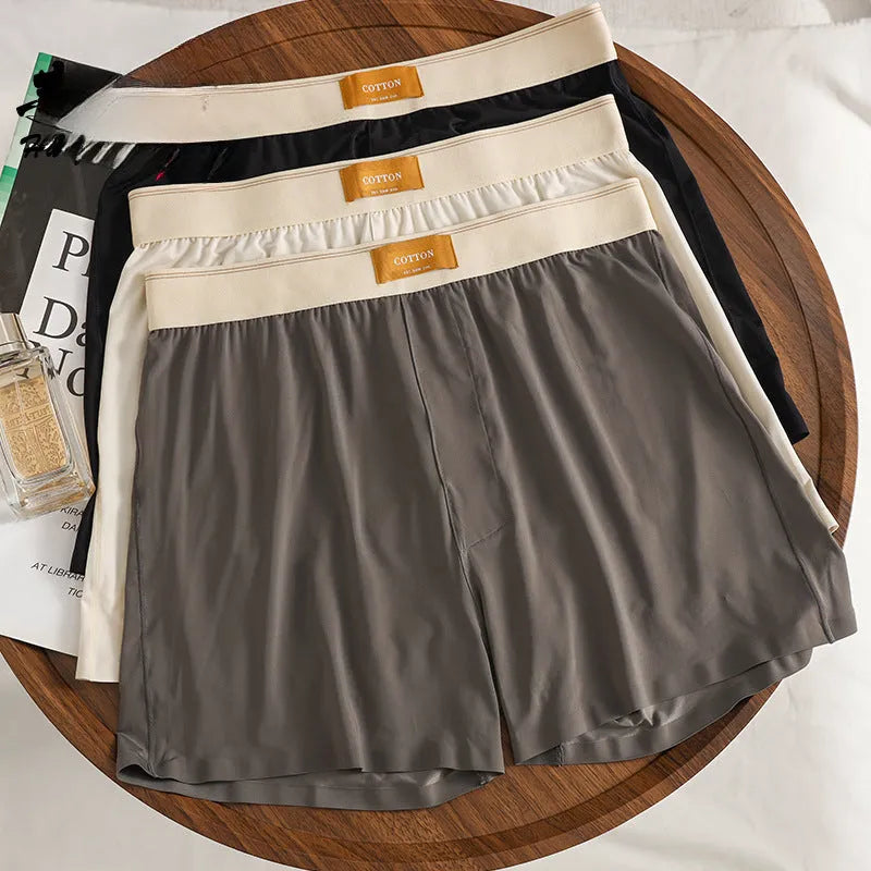 Men's ice silk underwear three-pack showing loose fit and solid colour options