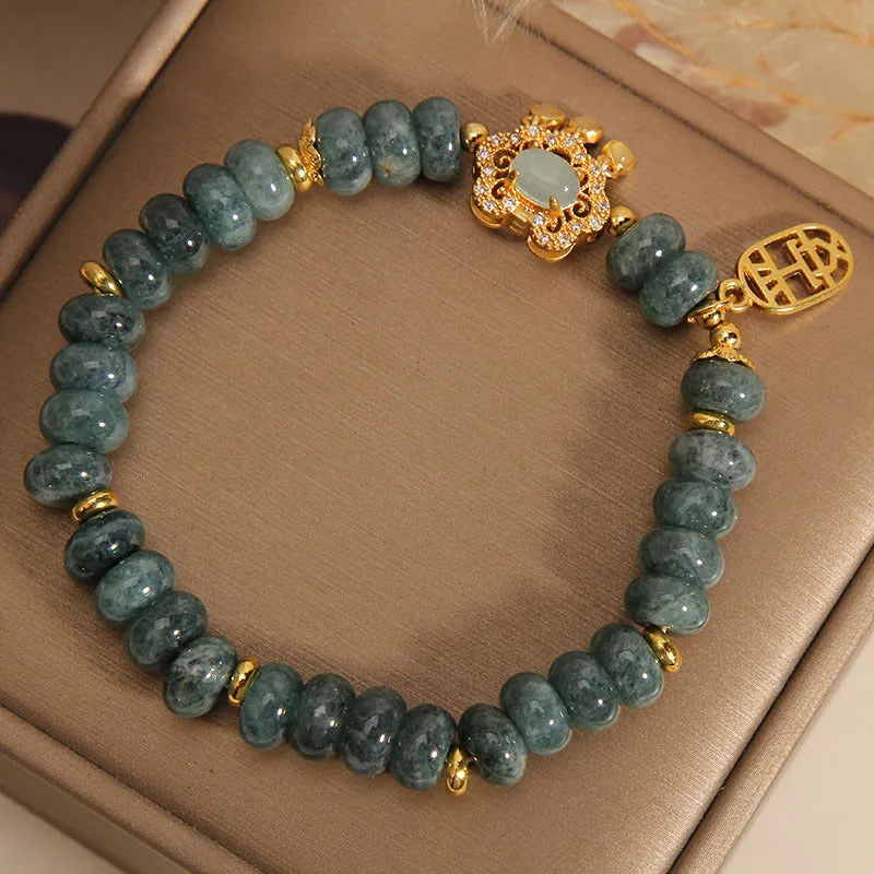 Women's natural emerald green jade bracelet with alloy safety lock clasp and abacus beads design