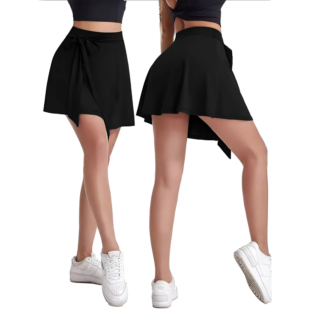 Black thigh-length sports skirt with built-in shorts, high waist, and culotte style.