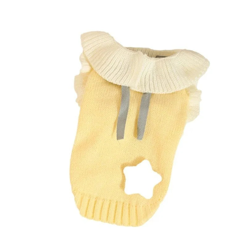 Yellow and patterned acrylic dog sweater shown in sizes for small puppies to 8kg dogs.