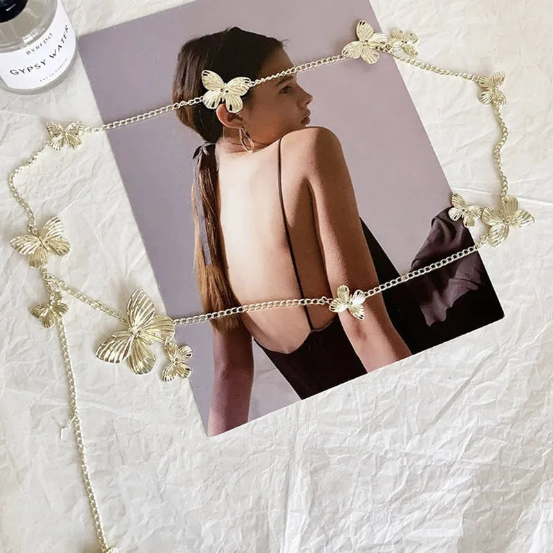 Gold butterfly waist chain with 104cm length and 40cm width on mannequin
