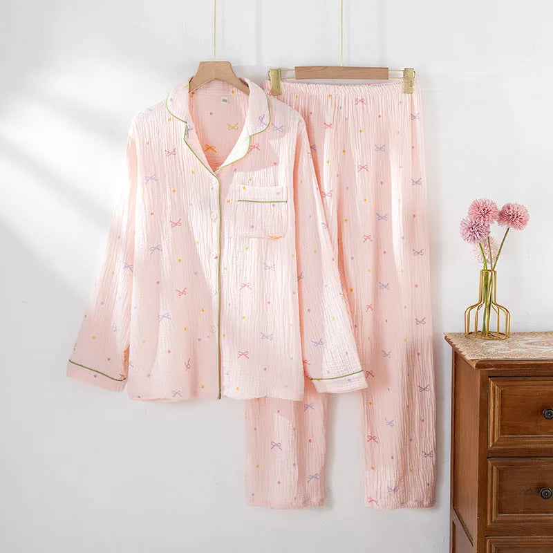 Women's cotton pajama set with long sleeves in lightweight crepe fabric, shown in pink colour