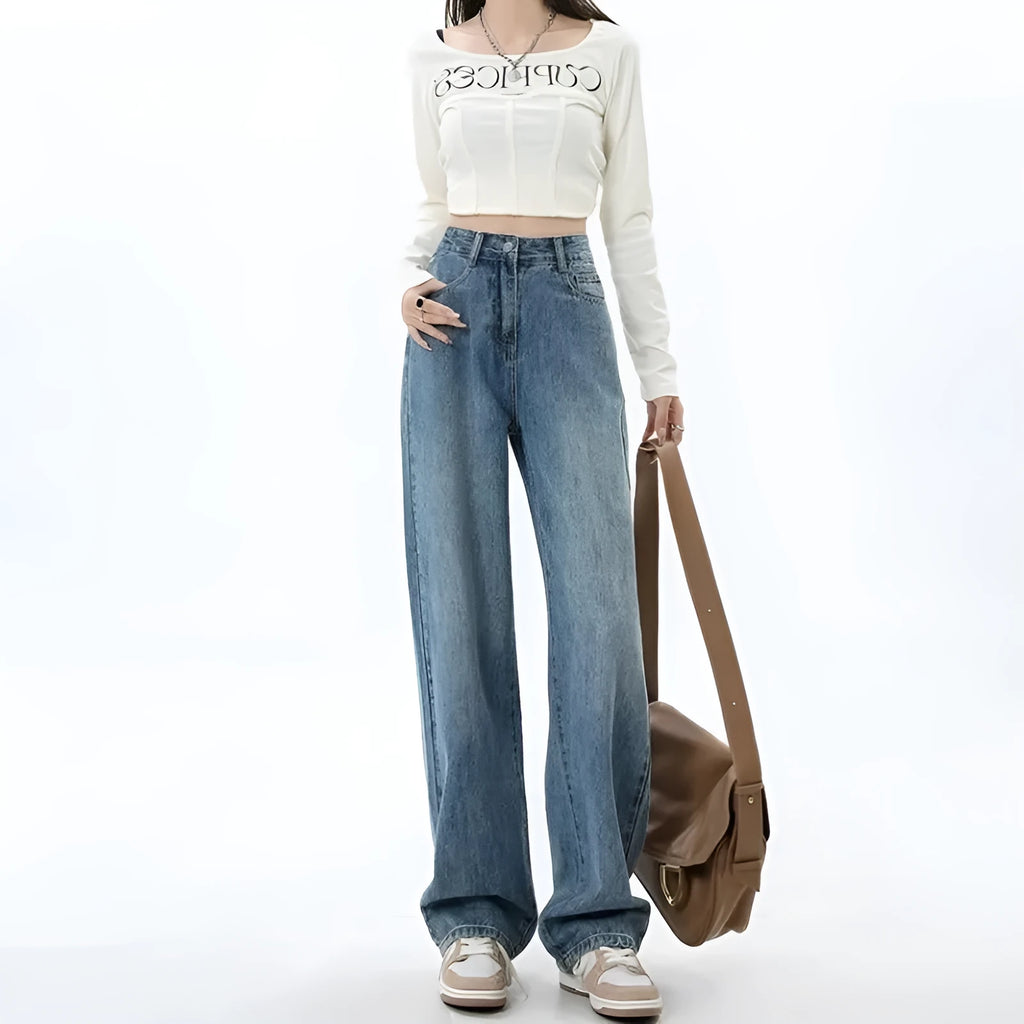 Women's retro blue high-waist wide-leg jeans laid flat, showing straight leg cut and denim texture.