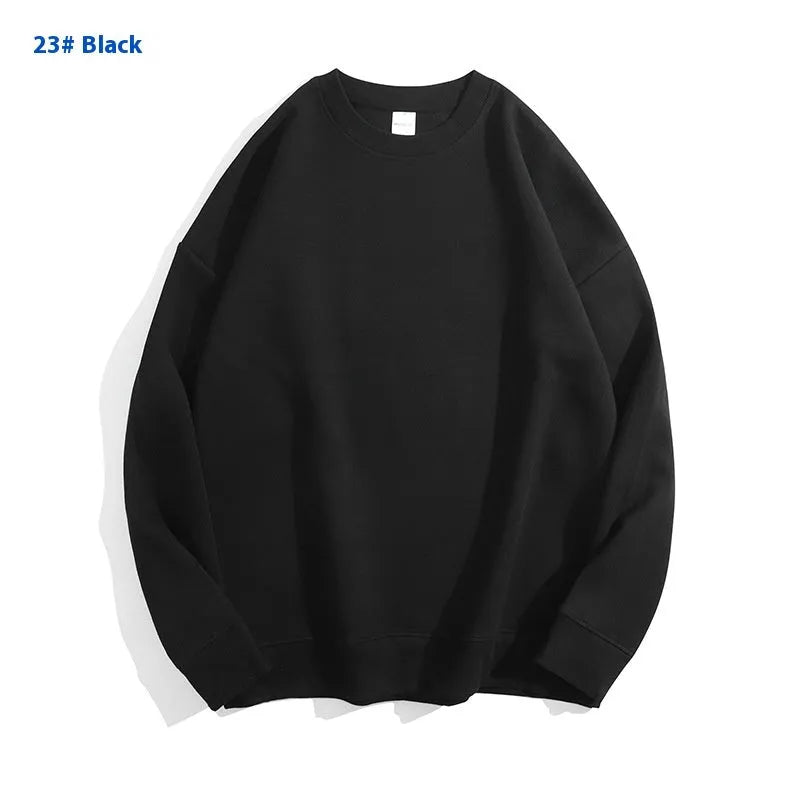 Women's loose fit cotton off shoulder sweater in a solid colour with round neck and long sleeves.