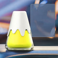 Glass car mounted snow mountain aroma diffuser with purple flower bouquet scent in vehicle interior
