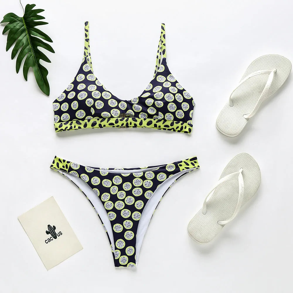 Women's red and white striped polyester bikini set and black and white polka dot bikini set.