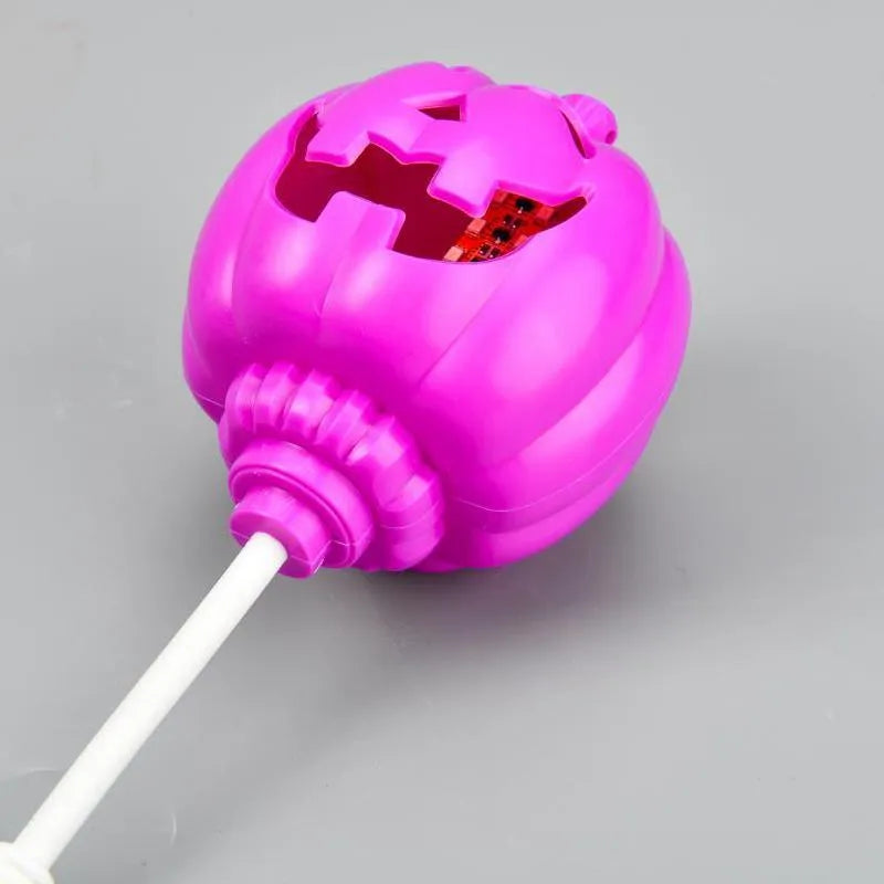 Plastic pumpkin decorative lamp with USB charging cable and yellow or purple light options