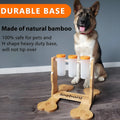 Wooden dog puzzle toy and interactive feeder in natural wood colour, dimensions 31x30x20cm.