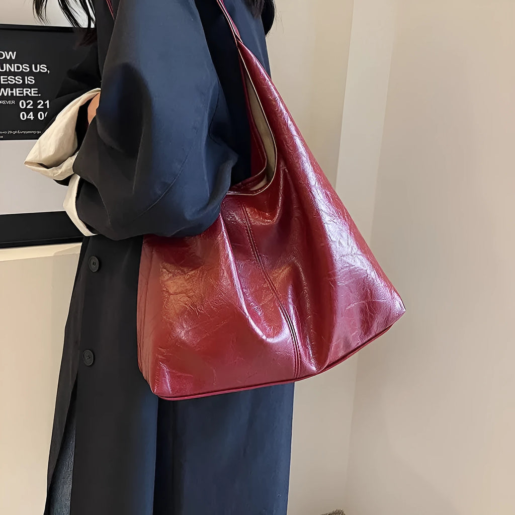 Casual soft leather shoulder bag with sandwich pockets in various colour options