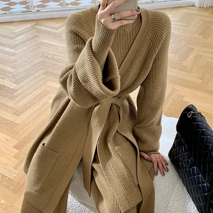 Women's apricot knitted three-piece set featuring a cardigan, wide-leg pants, and top with leather stitching details.