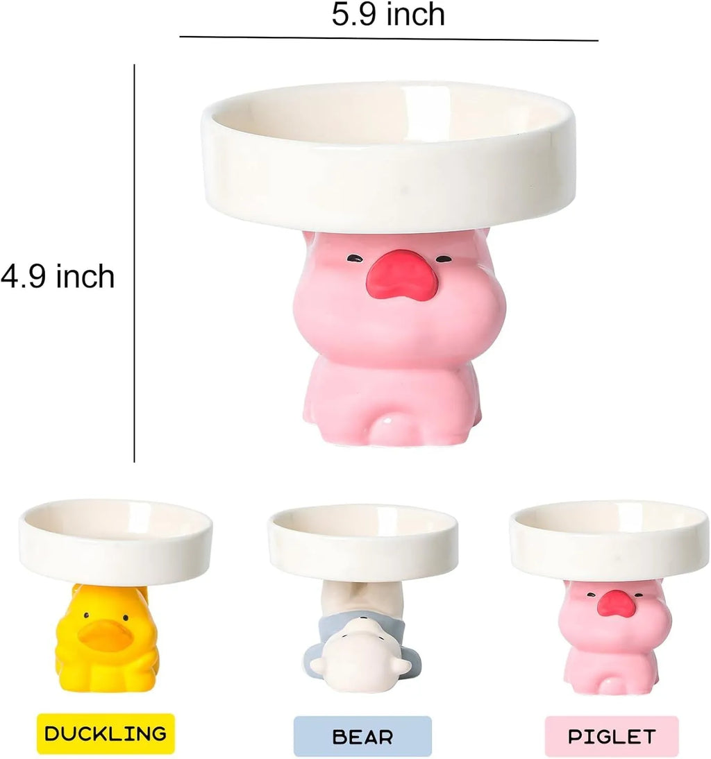 Raised ceramic cat bowl in animal design with wide opening for whisker-friendly feeding