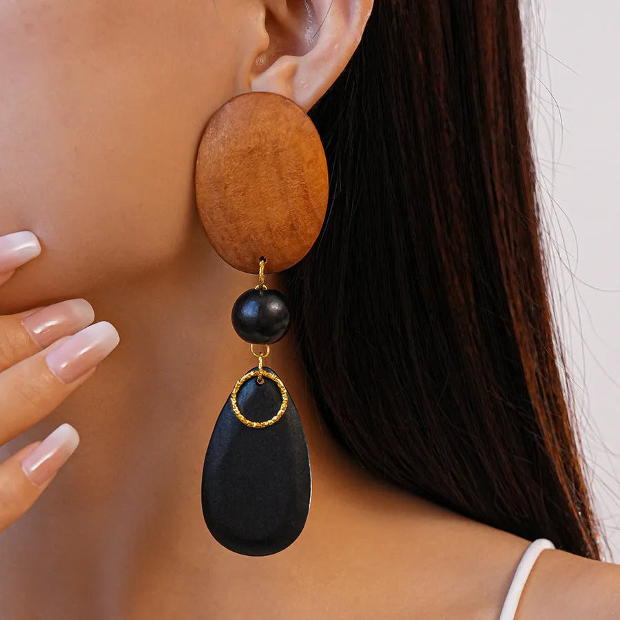 Handcrafted wooden ellipse earrings in silver brown black colours with retro European American style