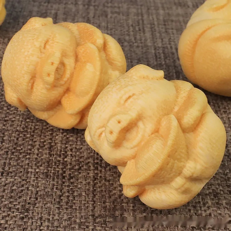 Fulu pig bamboo carving ornament measuring 4cm height with 3.5cm diameter in solid bamboo material