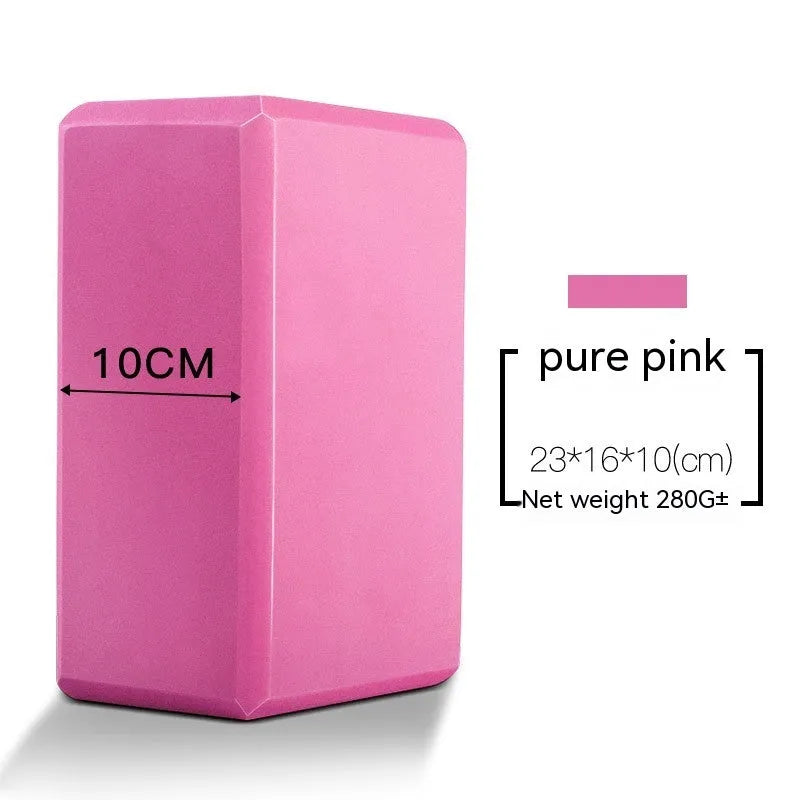 High-density EVA yoga block in violet colour next to a pink block with a cartoon print design.