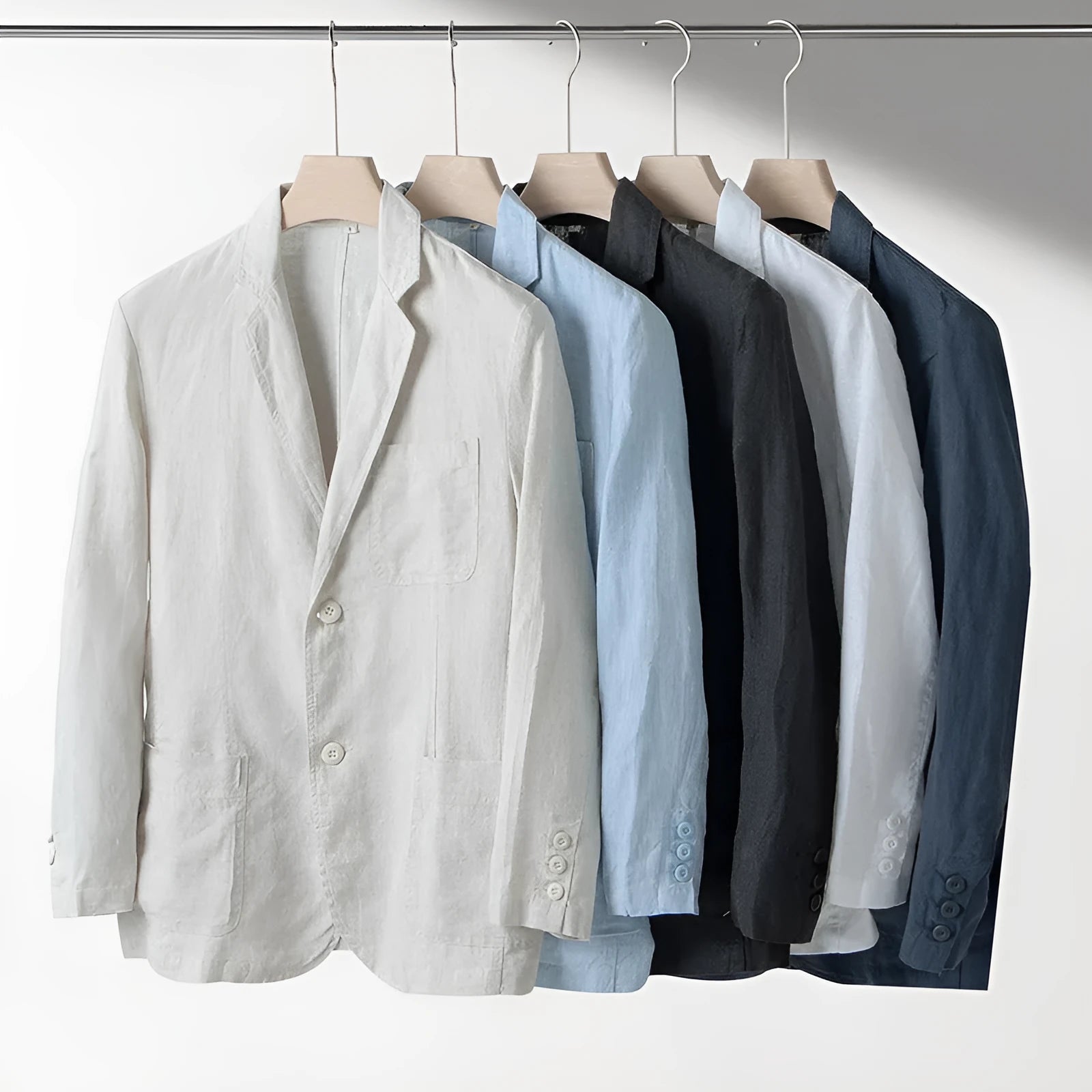 Men's loose-fit linen casual blazer jacket shown in available colours: white, black, natural linen, sky blue, and navy blue.