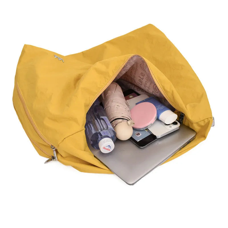 Heart-shaped nylon underarm bag with detachable shoulder strap in four colour options