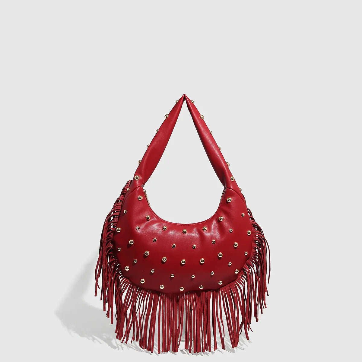 Retro black shoulder handbag with decorative tassel and internal mobile phone pocket
