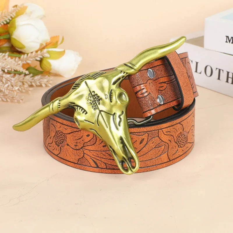 Men's black imitation leather belt with a detailed metal cow head buckle and pin clasp.