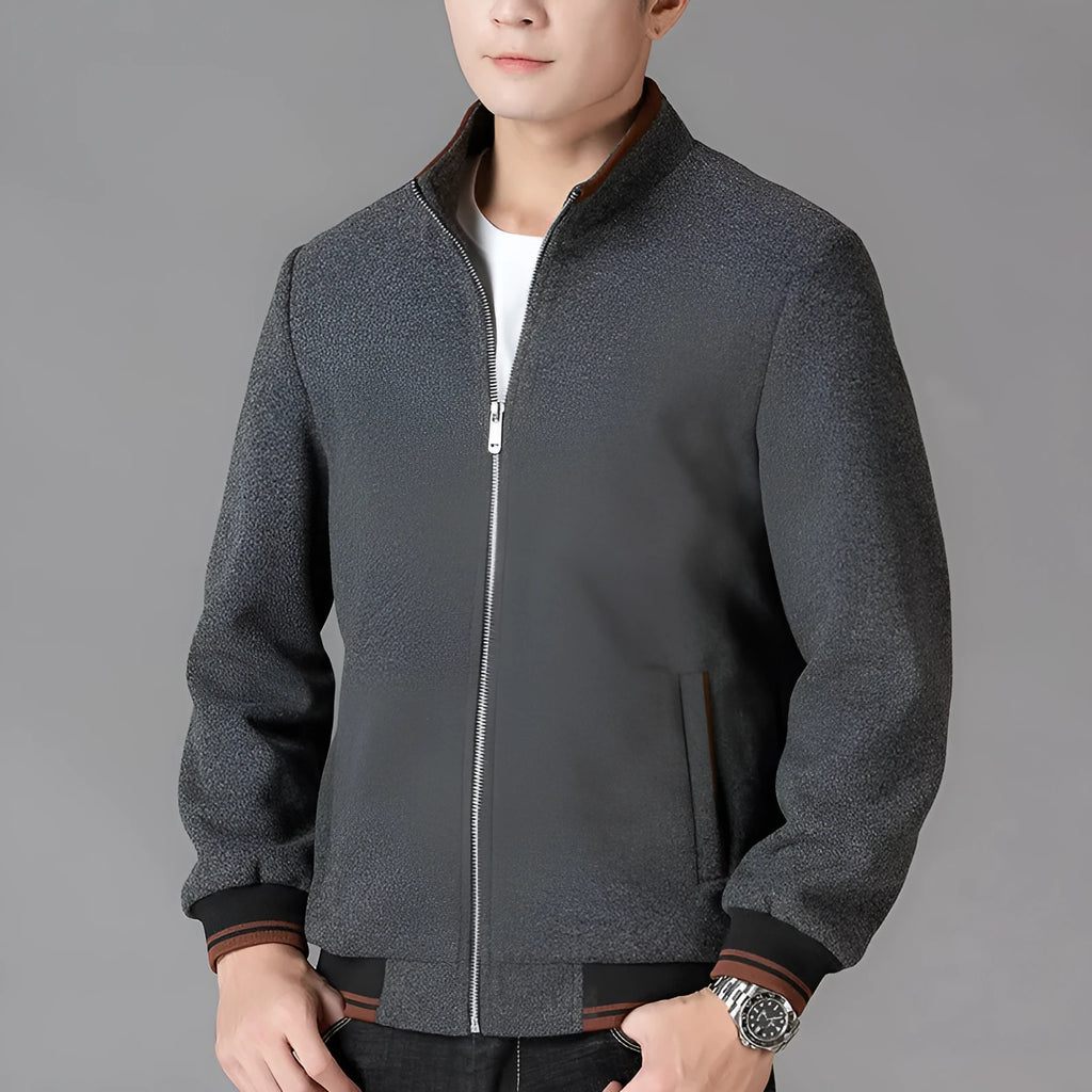 Men's grey fleece zip-up jacket with side pockets on a hanger