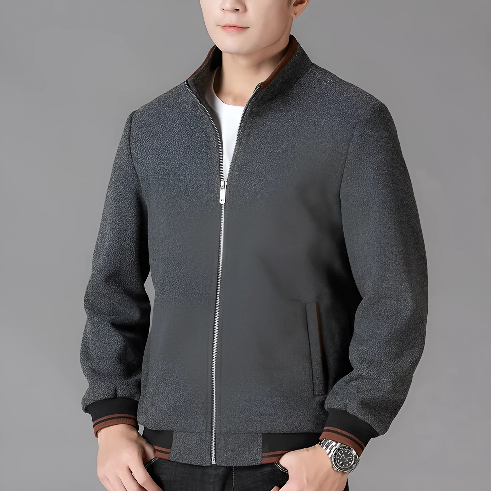 Men's grey fleece zip-up jacket with side pockets on a hanger
