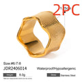 Stainless steel women's ring with geometric wide wave design and electroplated finish.