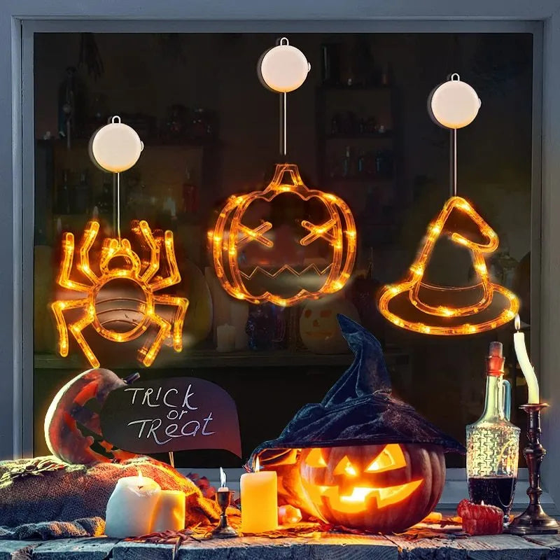Halloween window hanging LED lights with seven designs including spider, pumpkin, ghost, and bat motifs