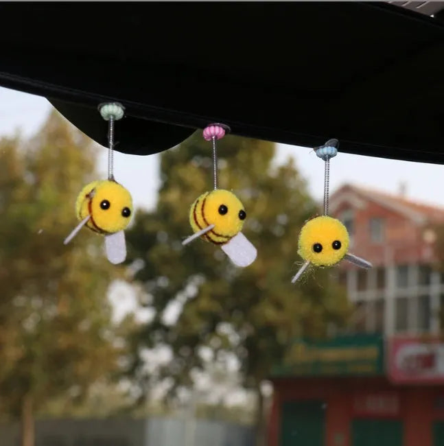 Yellow fur ball bee car decoration measuring 3cm square with cartoon design