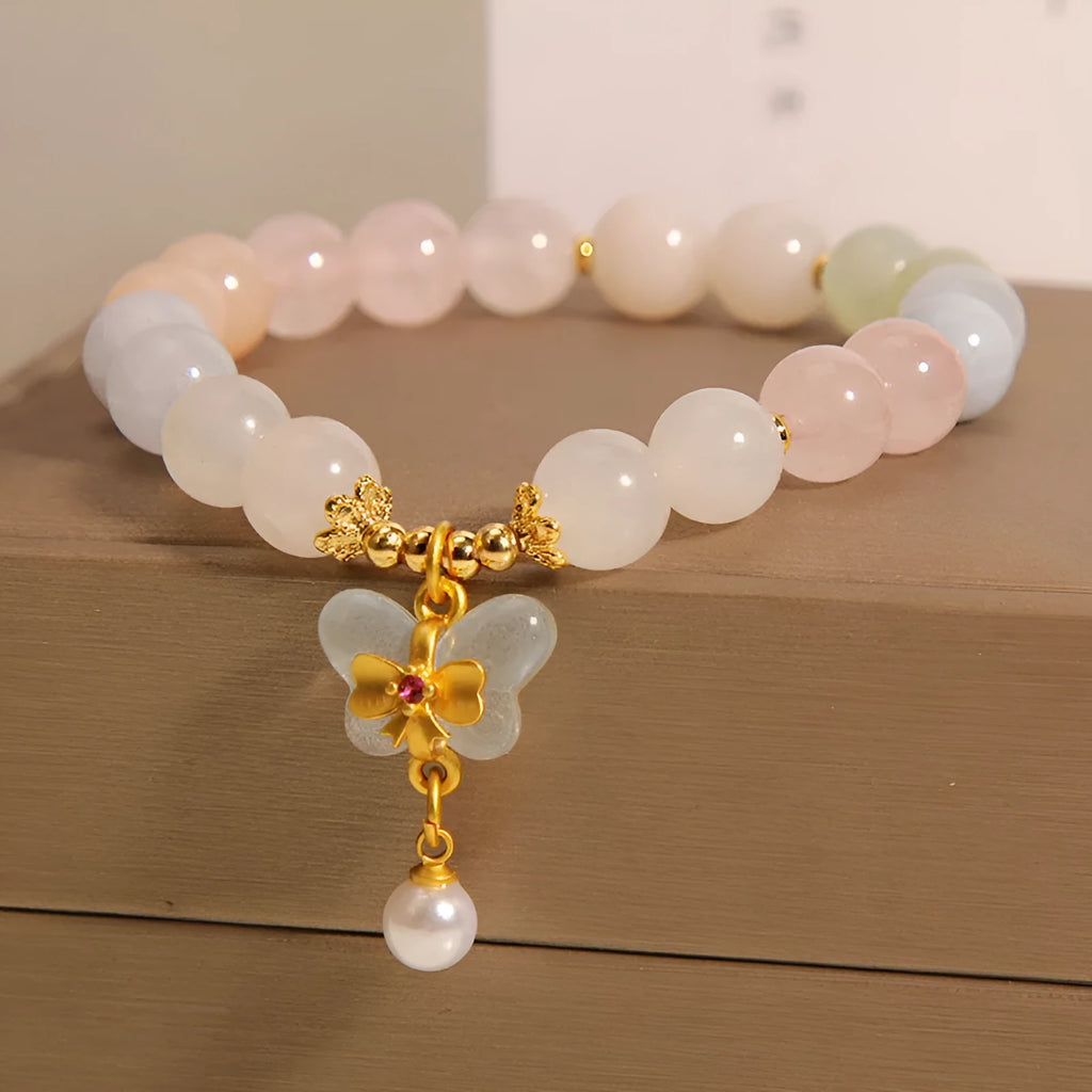 Morganite bracelet with colourful natural stone butterfly pendant on crystal bracelet
