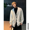 Men's loose-fit V-neck cotton blend cardigan sweater in army green, shown on a hanger.
