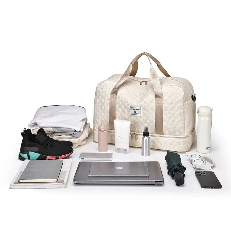 Oxford cloth travel bag with 36-55 litre capacity for leisure trips and buggy use in solid colour options