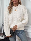 Women's khaki round neck sweater with twisted stitch detail and loose fit silhouette