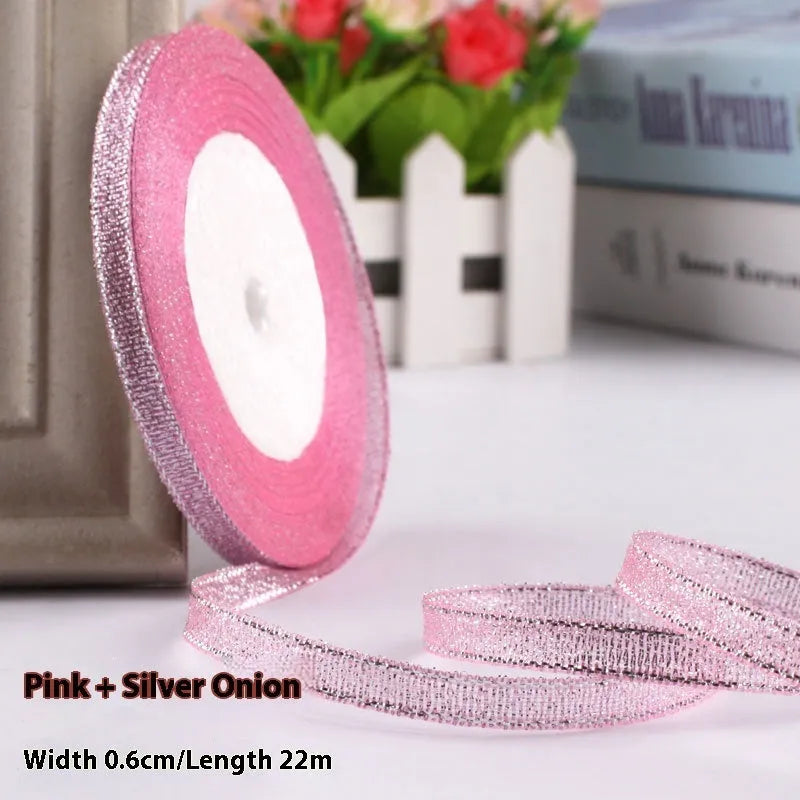 Roll of narrow 0.6cm wide polyester satin ribbon in a choice of colours, showing 22 metre length.